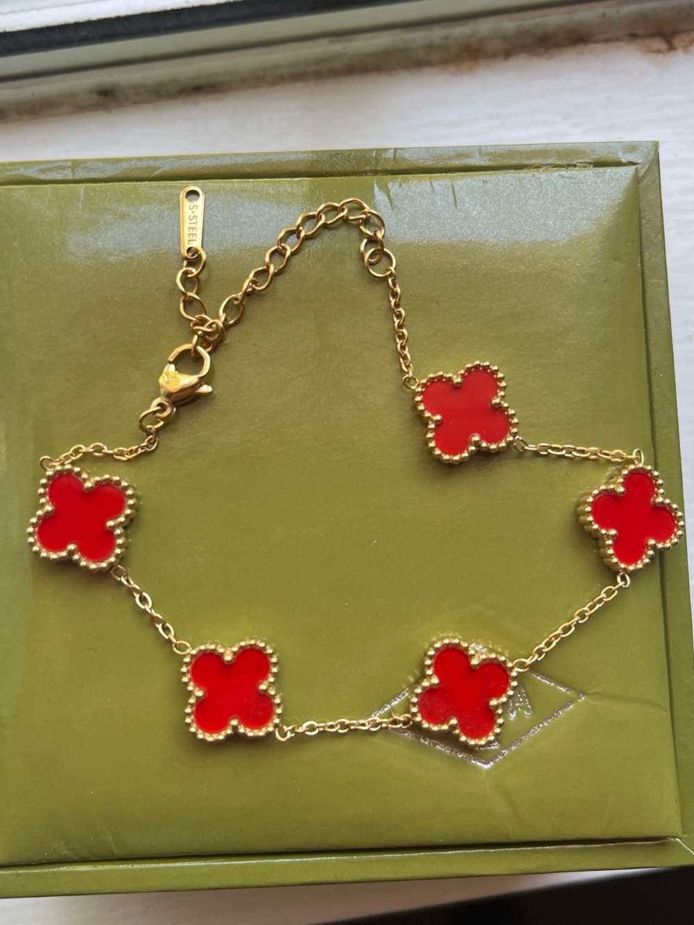 Van Cleef & Arpels Gold Bracelet with Red Alhambra Motifs